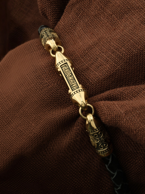 Браслет из лимонного золота c кожаным шнурком и ониксом