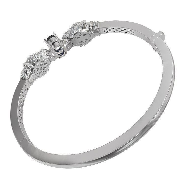 Браслет из белого золота c бриллиантами, сапфиром и изумрудом