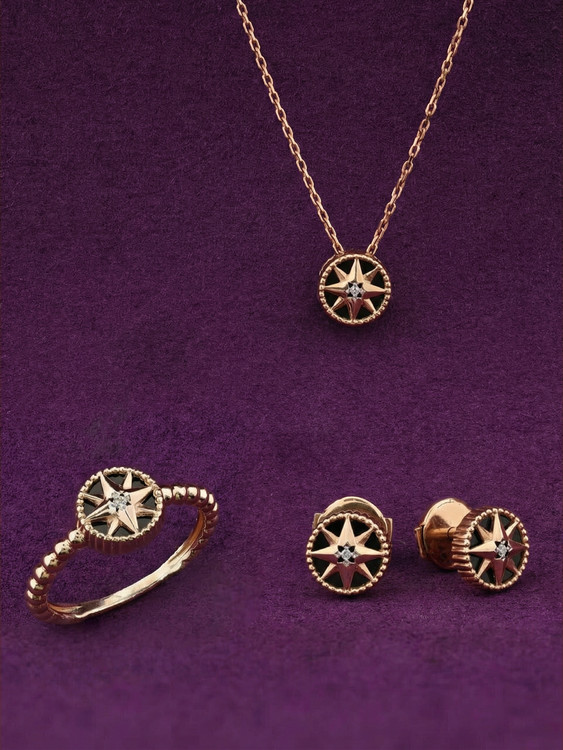 Кольцо из золота c бриллиантами и ониксом