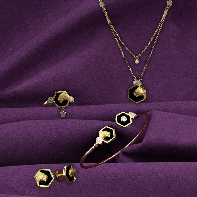 Кольцо из лимонного золота c бриллиантами и ониксом