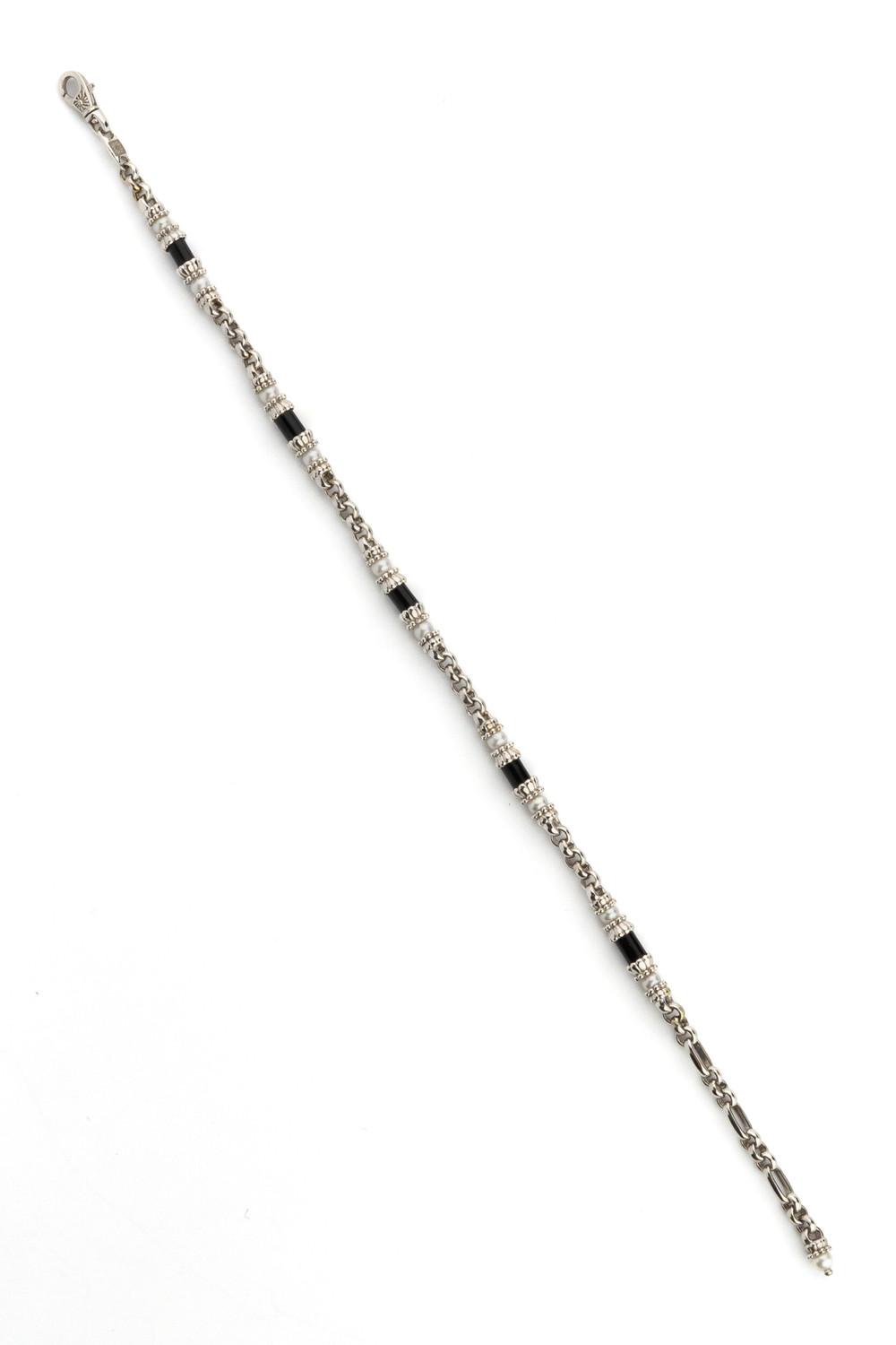 Браслет из белого золота c жемчугом и ониксом