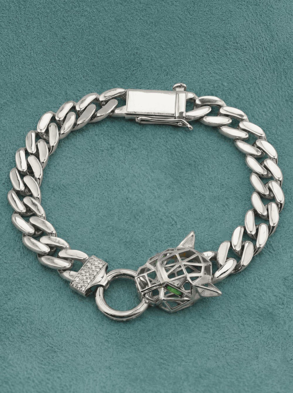 Браслет из белого золота c бриллиантами и изумрудом